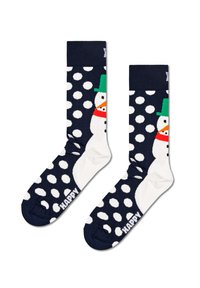Granatowe skarpetki w białe kropki mają wzór bałwanka w kolorze białym, zielonym i pomarańczowym. Na palcach skarpetek widnieje napis "HAPPY".
