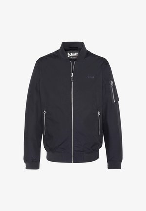 Giacca bomber nera con cerniera frontale, due tasche laterali con cerniera, tasca sulla manica con cerniera, polsini e orlo a costine, e logo Schott sul petto e all'interno del colletto.
