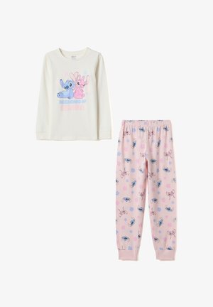 Maglietta bianca a maniche lunghe con stampa grafica di due personaggi e testo. Pantaloni rosa chiaro con un motivo degli stessi personaggi e fiori.