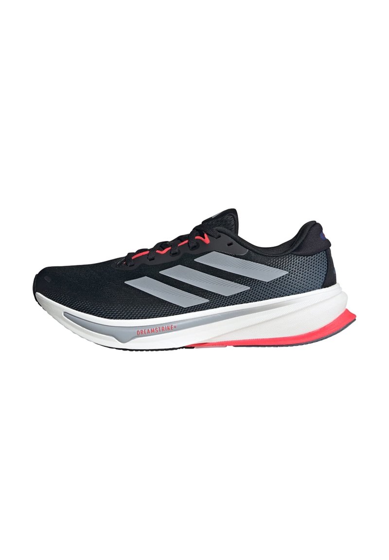 Zapatilla deportiva negra con rayas plateadas, acentos rosas, parte superior de malla transpirable, suela blanca acolchada y diseño elegante para mayor comodidad y rendimiento.