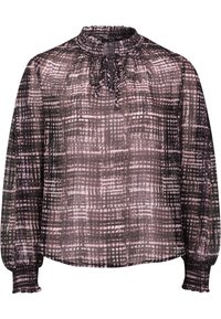 Blouse longue transparente à manches longues avec motif à carreaux rose et noir, col à volants, détail noué et poignets smockés.