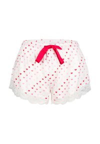 Bílé krátké pyžamo s růžovým a červeným vzorem srdcí, s krajkovým lemem ve tvaru vlnky a jasně růžovou tkaničkou v pase.