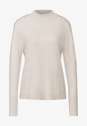 Pull léger beige à col montant côtelé, manches longues et coupe décontractée. Présente des panneaux texturés et des poignets côtelés au niveau de l'ourlet.