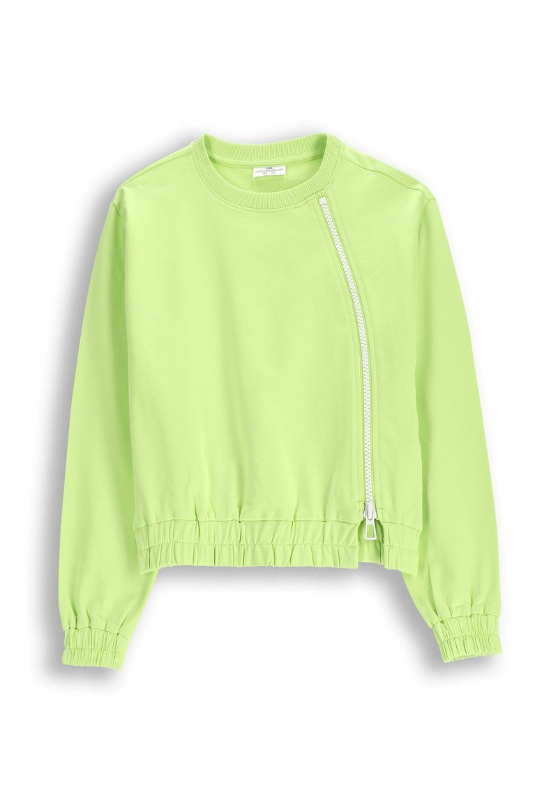 Jasnozielona krótka kurtka wykonana z miękkiego materiału. Posiada boczny zamek błyskawiczny oraz elastyczne mankiety z szeroką, żebrowaną talią.