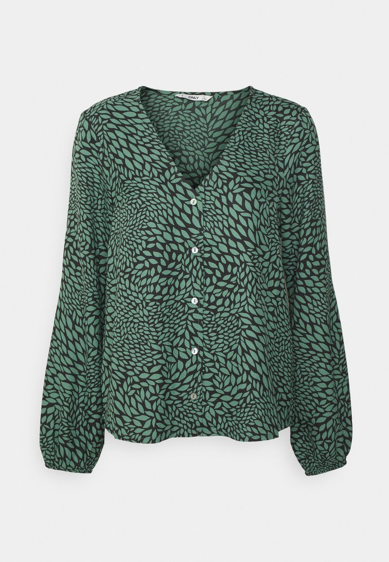 Blouse verte à manches longues boutonnée avec motif tourbillonnant de feuilles noires et poignets élastiques.