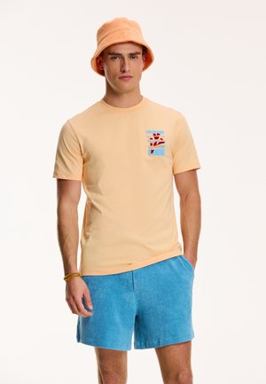 T-shirt print - cayman peach