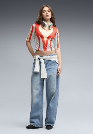 Puma, FUTURE.PUMA.ARCHIVE MOTO TOP - T-Shirt print - buttercream