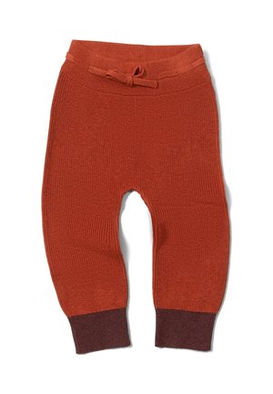 Strickhosen in verbranntem Orange mit gerippter Textur, ausgestattet mit einem breiten Bund und dunkelbrownem Saum. Enthält eine Kordel zum Verstellen.