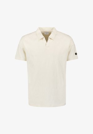 Korte mouwen polo in crème met een textuur patroon, voorzien van een V-hals en een zwart hexagonaal logo-embleem op de linker mouw.