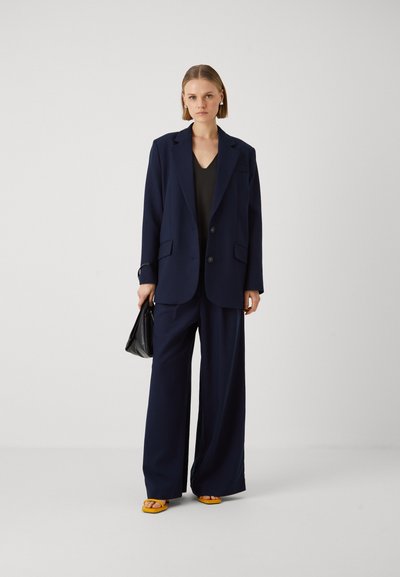 Pantalon femme I Quing coton bleu foncé marine strass