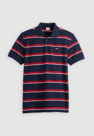 Polo shirt blu navy con strisce orizzontali rosse e bianche, colletto con tre bottoni e piccolo logo Levi's sul petto. Realizzato in morbido cotone.