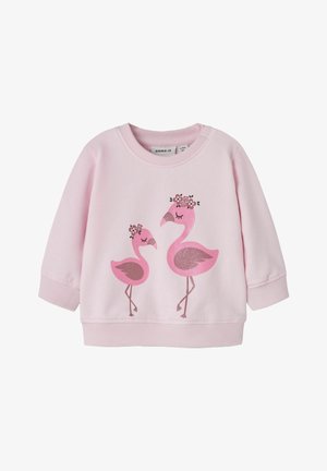 Sweat-shirt rose clair pour tout-petits avec deux flamants roses portant des couronnes de fleurs imprimées sur le devant, poignets et ourlet côtelés.