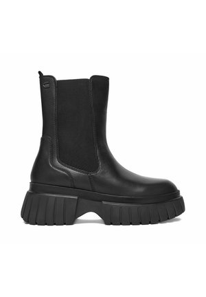 Black leather ankle boot with chunky lug sole and elastic side panel for easy slip-on.