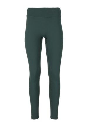 Leggings verde oscuro hechos de tela elástica. Diseño de cintura alta con bordes sin costura y un acabado mate suave. Ajuste entallado en todo el cuerpo.