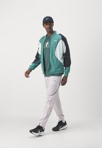 Nike Performance Trainingsjacke - bicoastal/black/barely green/white