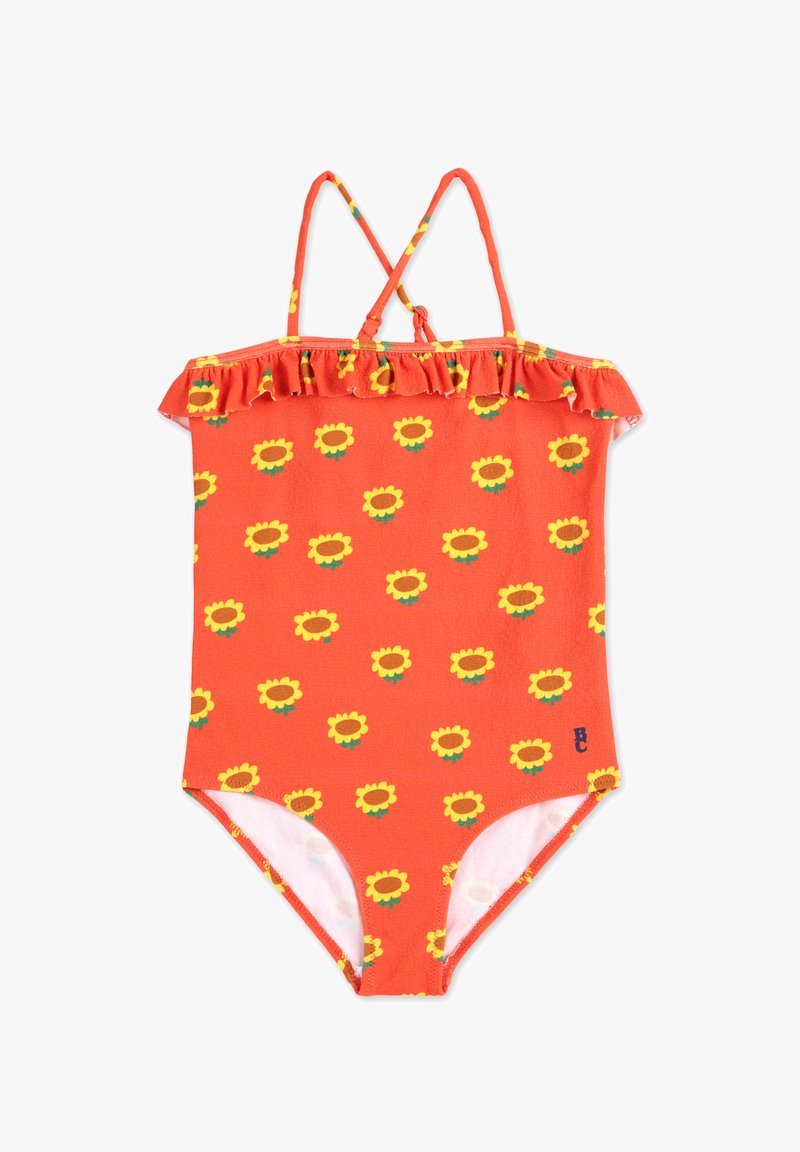 Red one-piece swimsuit with yellow sunflower pattern, ruffled neckline, adjustable straps, and a smooth fabric texture.