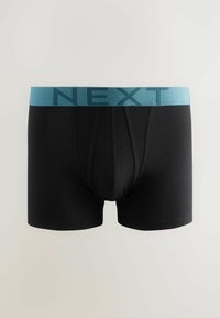 Fekete boxer alsónadrág puha, elasztikus derékpánttal világos türkiz színben, amelyen nagy betűkkel szerepel a "NEXT" felirat. Az anyag sima és testhezálló hatású.