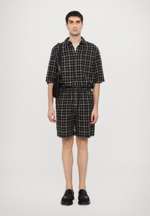 Henrik Vibskov WAYBILL UNISEX - Shorts - black