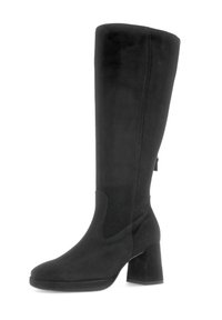 Bota negra hasta la rodilla en suave material de ante con un tacón cuadrado. Presenta un cierre lateral y un diseño ajustado sin embellishments visibles.