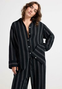 Lindex OVERSIZE - Maglia del pigiama - black