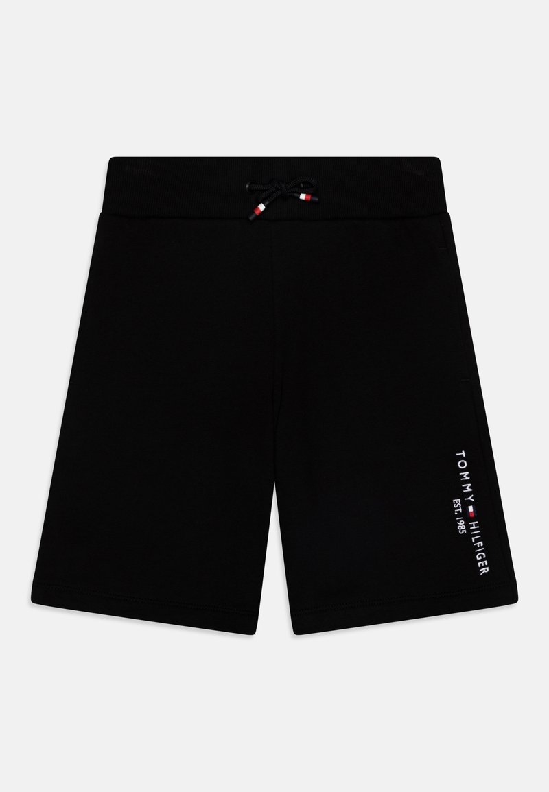 Shorts actifs noirs avec un waistband à cordon de serrage, comportant un logo blanc sur la jambe gauche et une texture de tissu lisse et douce.