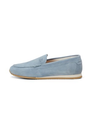 Light blue suede loafers with a closed toe, low-profile design, contrasting beige rubber sole, and subtle branding detail on the heel.