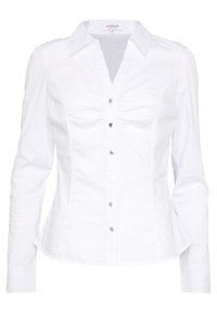 Vit knäppskjorta med klassisk krage, långa ärmar, åtsittande design och subtil samling vid bysten. Har silverknappar.