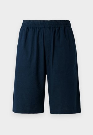 Navy blue shorts made from lightweight fabric, featuring an elastic waistband and a relaxed fit, with two side pockets.