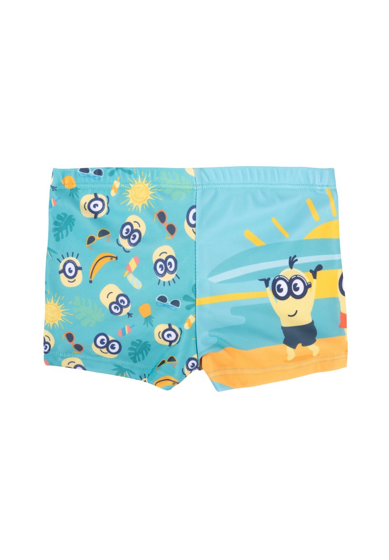 Costumi da bagno per bambini in turchese con motivi dei Minion, che presentano soli ed elementi tropicali; dettagli gialli, elastico in vita e materiale comodo.
