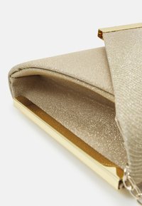 Menbur Psaníčko - gold-coloured