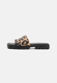 Leopard print slide sandals with a black rubber sole, featuring a smooth, shiny upper and a wide strap for easy wear.