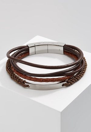 Multi-strand brown leather and braided cord bracelet with silver magnetic clasp and rectangular metal plate on a white surface.