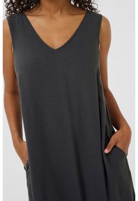 Ärmelloses, dunkelgraues Kleid aus leichtem Stoff mit V-Ausschnitt, seitlichen Taschen und einem lockeren Schnitt.