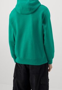 Nike Sportswear Mikina s kapucí - green