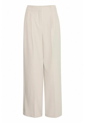 Pantalons larges taille haute de couleur crème avec plis, fabriqués à partir d'un tissu lisse, présentant un design épuré et une coupe ajustée.