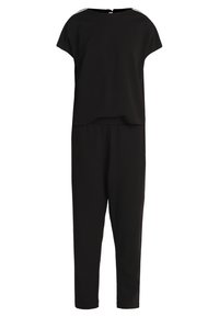 Svart jumpsuit i mjuk tyg; har en lös topp med rund halsringning och avsmalnande byxor; inkluderar en detalj med bakstängning.