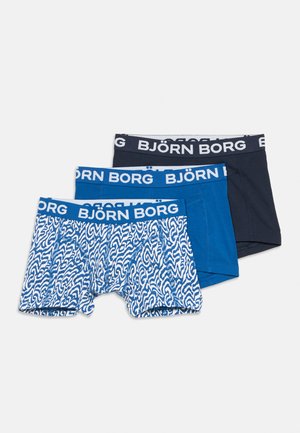Tri páry pánskych boxerek v čiernej, jednolavej modrej a modro-bielej potlači, každé s pásom značky „BJÖRN BORG“.