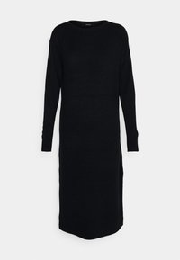 Černé pletené šaty s dlouhými rukávy, kulatým výstřihem a bočními rozparky. Hladká textura a délka po kolena. Minimalistický styl bez vzorů.