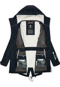 Navy blue jacket with white polka dots, featuring a soft lining, zippered pockets, drawstring hood, and interior care labels.