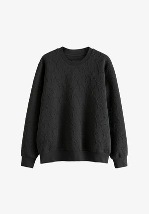 Black sweatshirt with a textured pattern featuring deer motifs. Ribbed neckline and cuffs, long sleeves, and a relaxed fit.
