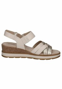 Sandalice na petu s bež kožnim gornjim dijelom, metalik srebrnim detaljima i tkanim uzorkom na pluto bazi. Podesiva anklet traka za bolju prilagodbu.
