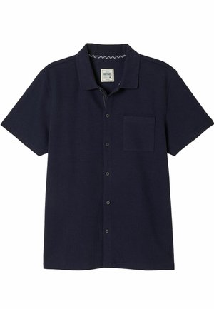 Short-sleeve navy blue button-up shirt with collar and chest pocket, flat-lay view on white background.
