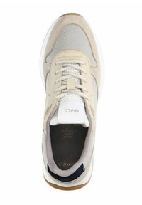 Beige athletic shoe with mesh and suede materials. Features a white lace-up front, a padded collar, and a brown rubber outsole.