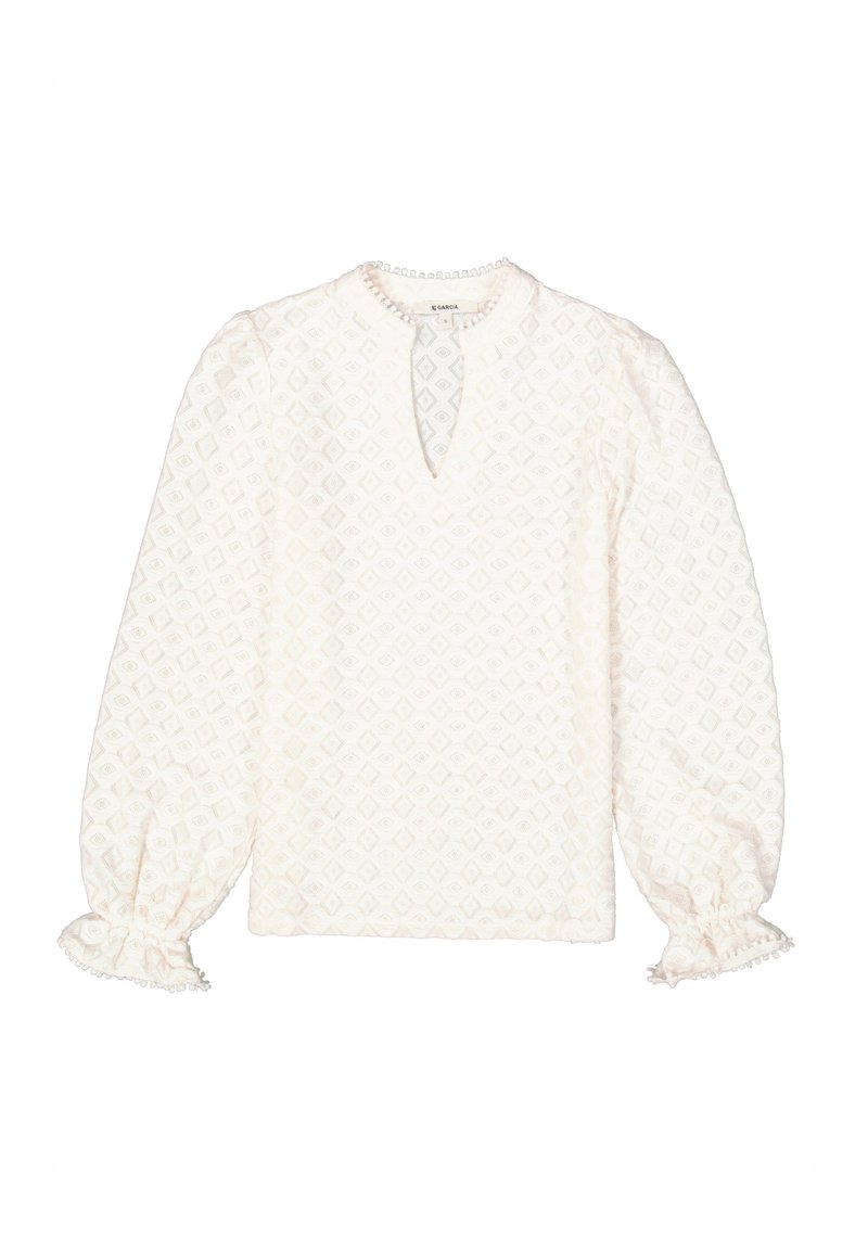 Weiße Bluse mit Diamantmuster, V-Ausschnitt, langen Puffärmeln und gerafften Manschetten. Strukturierte Baumwolle mit Rüschendetail am Ausschnitt.