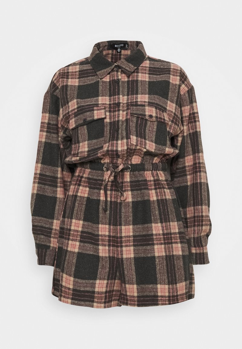 Plaid shirt dress in black, pink, and beige with a collar, two chest pockets, and an adjustable drawstring waist. Soft, textured fabric.