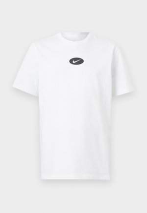T-shirt blanc à manches courtes avec col rond, orné d'un ovale noir et du logo Nike swoosh blanc centré sur la poitrine.