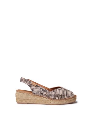 Slingback-Espadrille-Keilabsatz-Sandale mit Obermaterial aus beige-schwarz gestreiftem Zebramuster-Stoff und geflochtener Jutsohle.