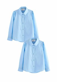 Camicia a maniche lunghe azzurro chiaro realizzata in tessuto morbido, con colletto classico, chiusura a bottoni e maniche a sbuffo, con cuciture decorative.