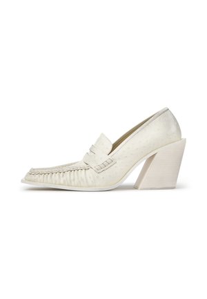 White textured leather women's loafer with a high angled block heel and fringe detailing on the toe and strap.
