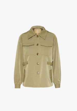 Khaki jaka ar apkakli, četrām priekšējām kabatām, pogu aizdari un elastīgām aprocēm. Gluda tekstūra ar brīvs piegriezums.